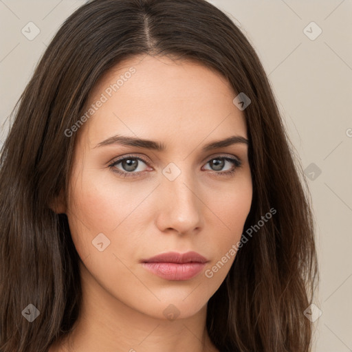 Neutral white young-adult female with long  brown hair and brown eyes