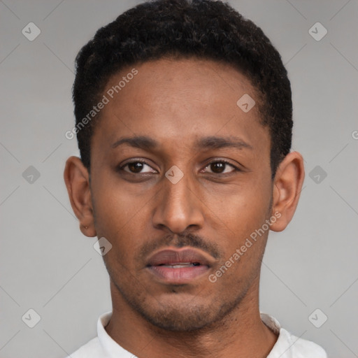 Neutral latino young-adult male with short  black hair and brown eyes