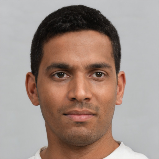 Neutral black young-adult male with short  black hair and brown eyes