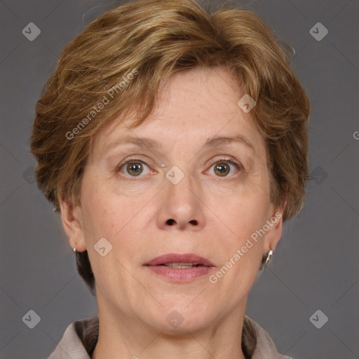 Joyful white adult female with short  brown hair and grey eyes