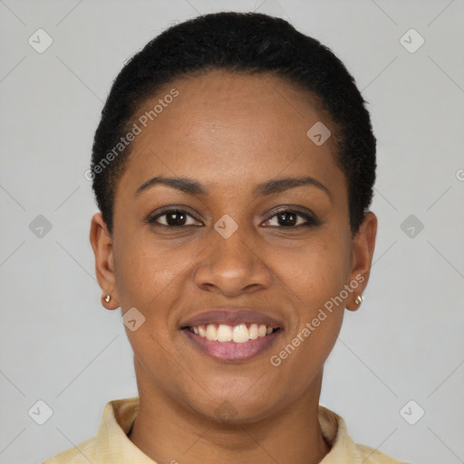 Joyful latino young-adult female with short  black hair and brown eyes