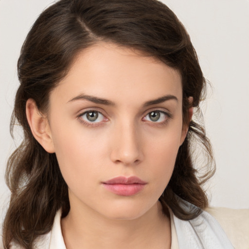 Neutral white young-adult female with medium  brown hair and brown eyes