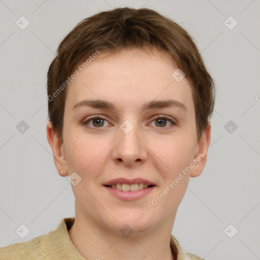 Joyful white young-adult female with short  brown hair and grey eyes