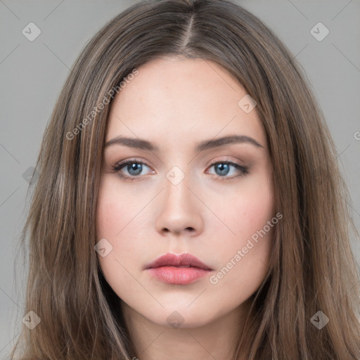 Neutral white young-adult female with long  brown hair and brown eyes