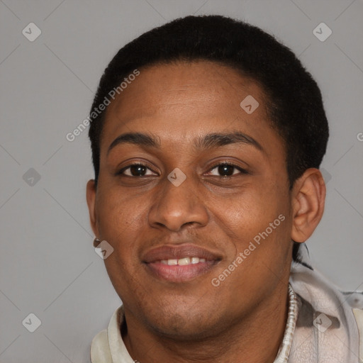 Joyful black adult female with short  brown hair and brown eyes