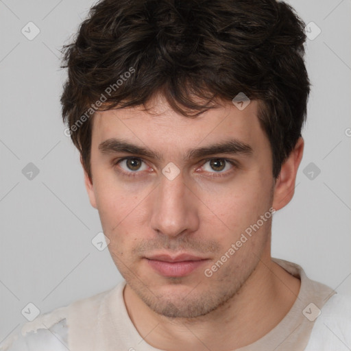 Neutral white young-adult male with short  brown hair and brown eyes