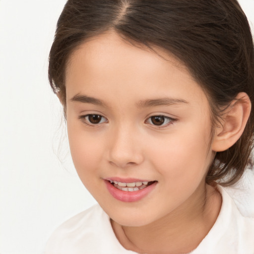 Joyful white child female with medium  brown hair and brown eyes