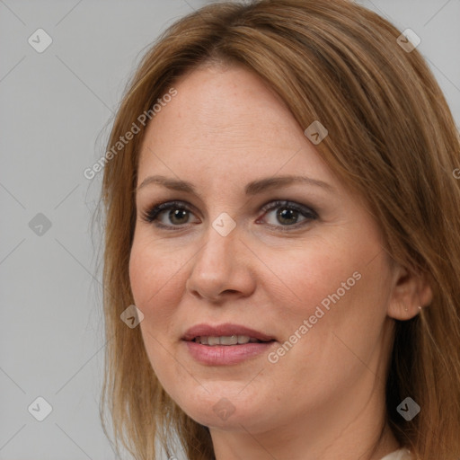 Joyful white adult female with medium  brown hair and brown eyes