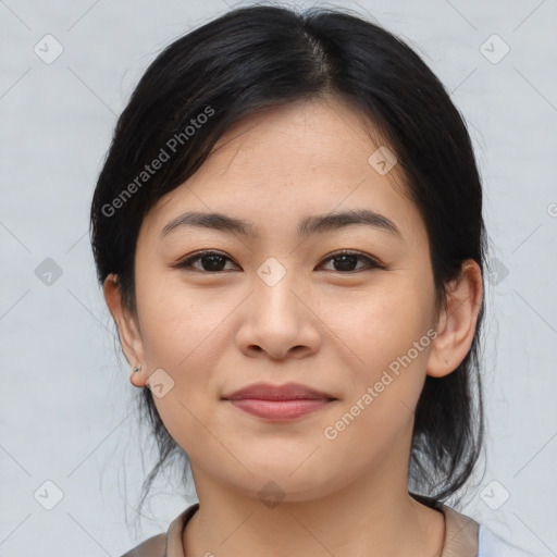 Joyful asian young-adult female with medium  brown hair and brown eyes