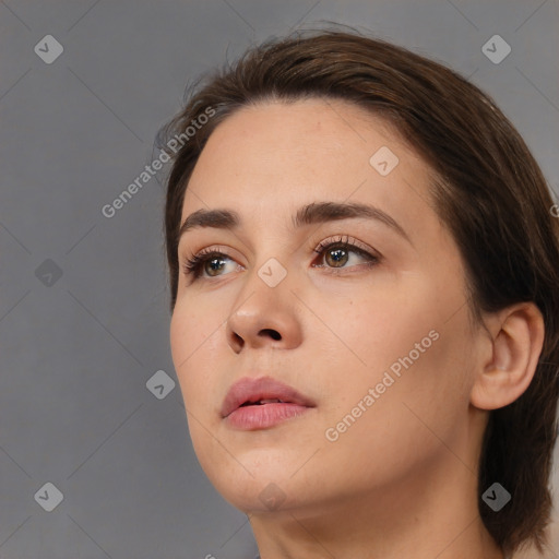 Neutral white young-adult female with medium  brown hair and brown eyes