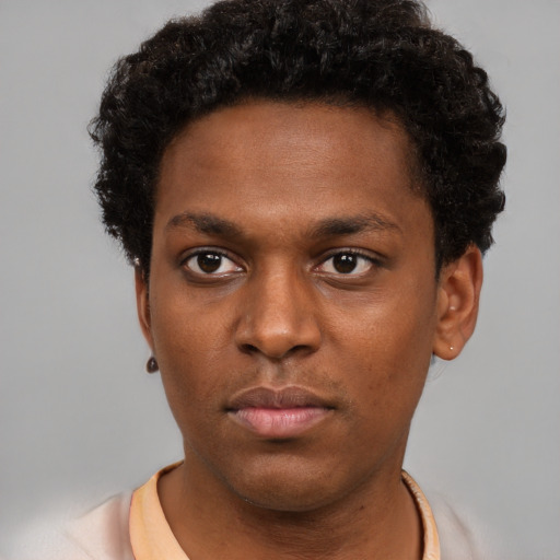 Neutral black young-adult male with short  brown hair and brown eyes