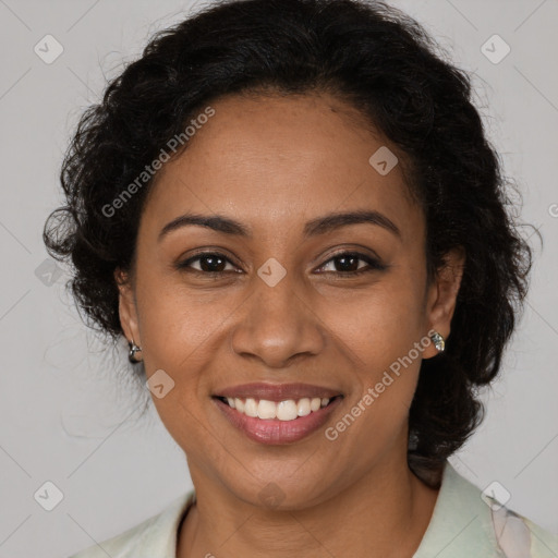 Joyful black young-adult female with medium  brown hair and brown eyes