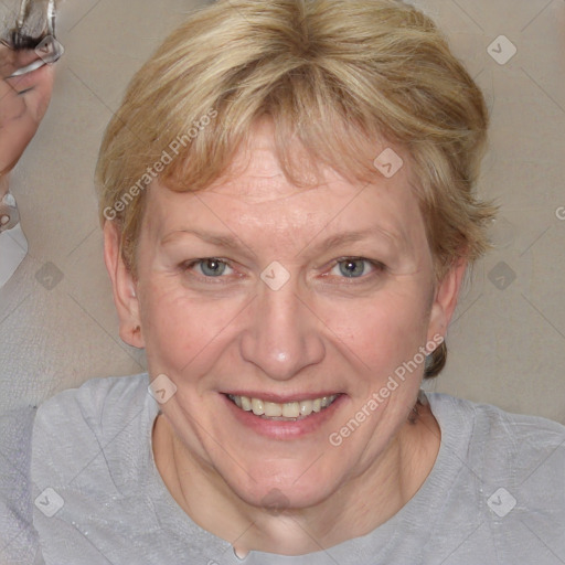 Joyful white adult female with medium  brown hair and blue eyes