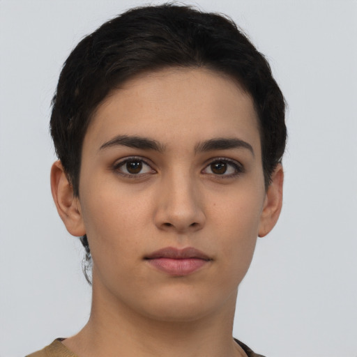 Neutral latino young-adult female with short  brown hair and brown eyes