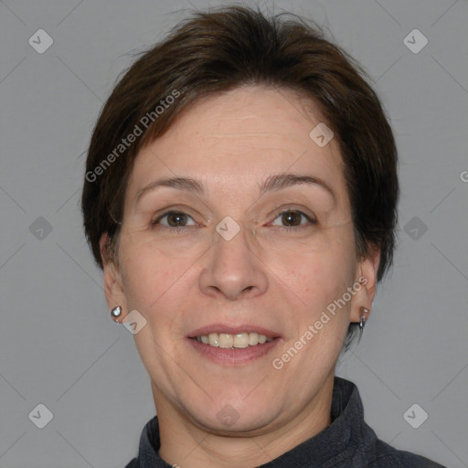 Joyful white adult female with short  brown hair and brown eyes