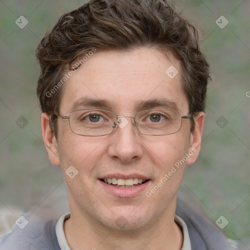 Joyful white adult male with short  brown hair and grey eyes