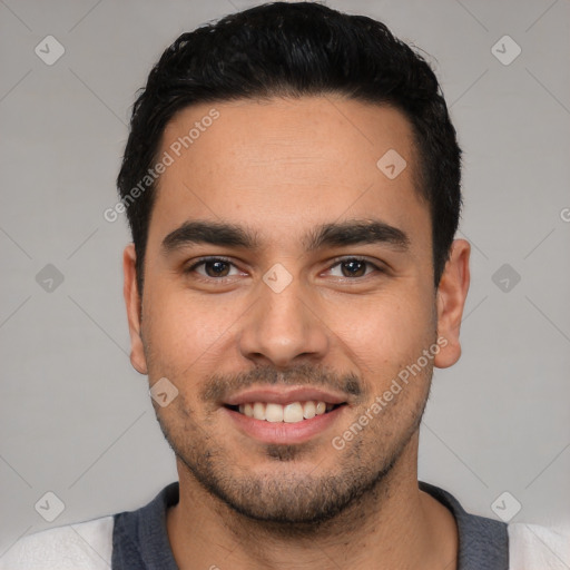 Joyful white young-adult male with short  black hair and brown eyes