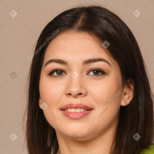 Joyful asian young-adult female with long  brown hair and brown eyes