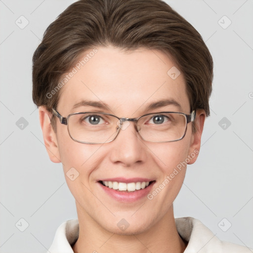 Joyful white young-adult female with short  brown hair and grey eyes