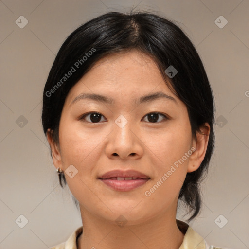 Joyful asian young-adult female with medium  brown hair and brown eyes