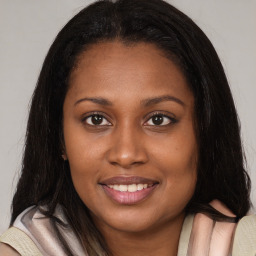 Joyful asian young-adult female with long  brown hair and brown eyes