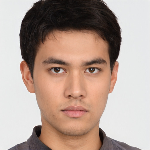 Neutral asian young-adult male with short  brown hair and brown eyes