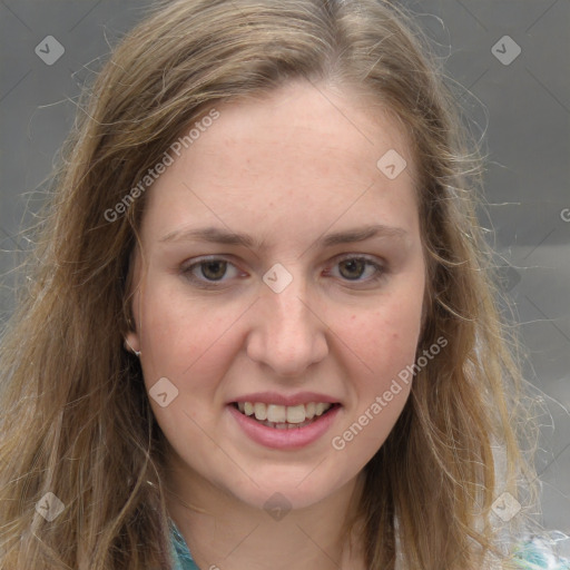 Joyful white young-adult female with long  brown hair and grey eyes