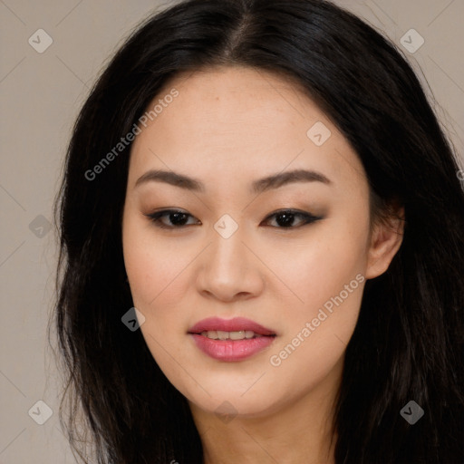 Joyful asian young-adult female with long  brown hair and brown eyes