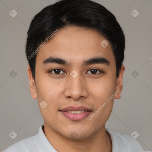 Joyful asian young-adult male with short  black hair and brown eyes