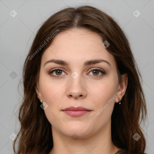 Joyful white young-adult female with long  brown hair and green eyes