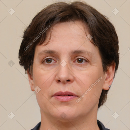 Joyful white adult female with short  brown hair and brown eyes