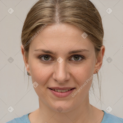 Joyful white young-adult female with medium  brown hair and grey eyes