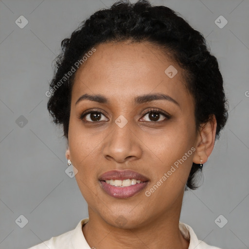 Joyful latino young-adult female with short  brown hair and brown eyes