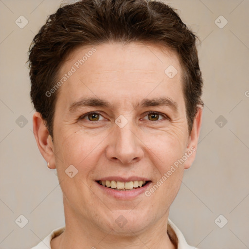 Joyful white adult male with short  brown hair and grey eyes