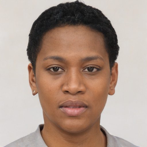 Neutral black young-adult female with short  black hair and brown eyes