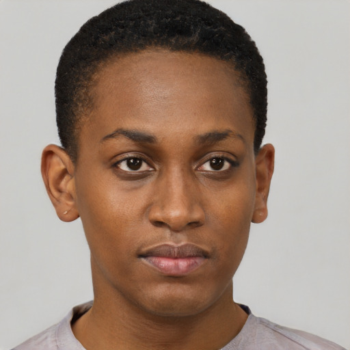 Neutral black young-adult female with short  brown hair and brown eyes