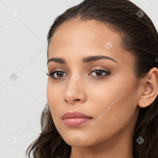 Neutral white young-adult female with long  brown hair and brown eyes