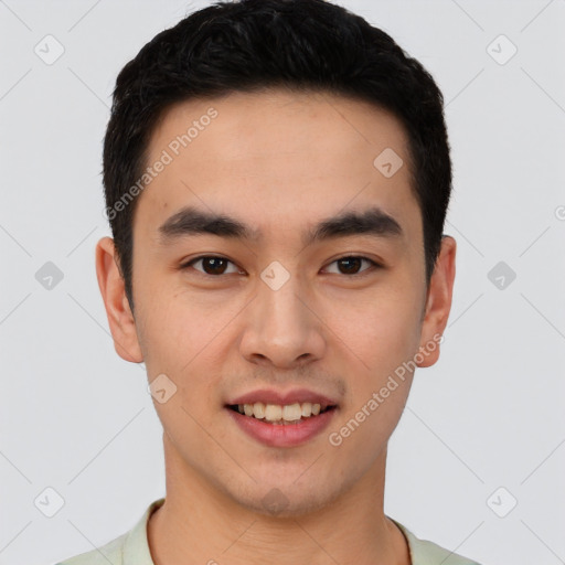 Joyful white young-adult male with short  black hair and brown eyes