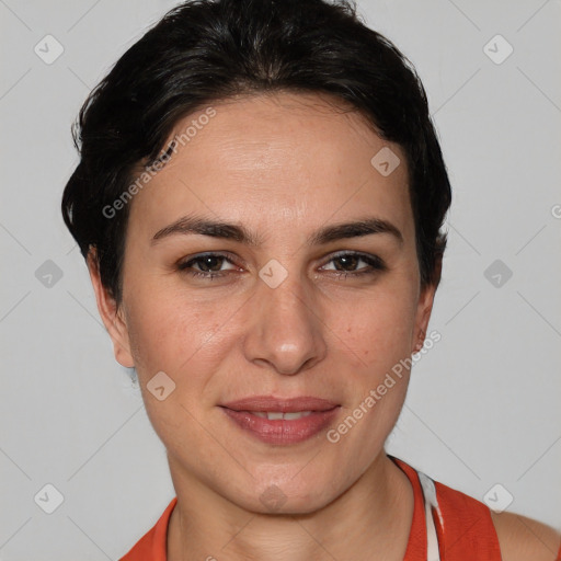 Joyful white young-adult female with short  brown hair and brown eyes