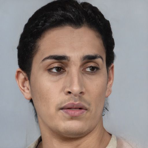 Neutral latino young-adult male with short  brown hair and brown eyes