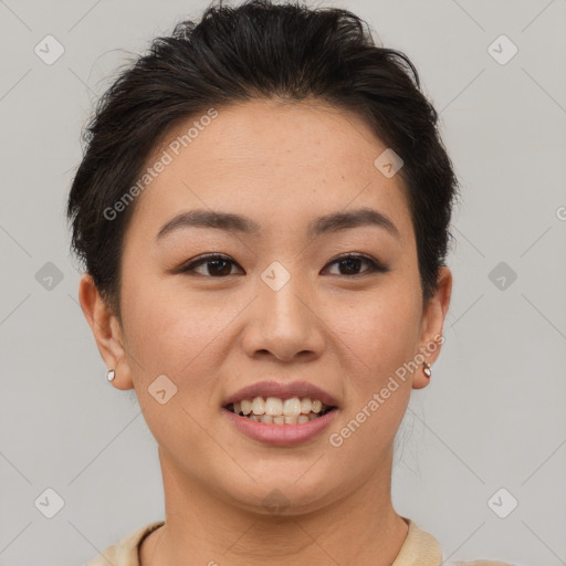 Joyful asian young-adult female with short  brown hair and brown eyes