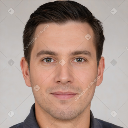 Joyful white young-adult male with short  brown hair and brown eyes