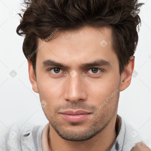 Neutral white young-adult male with short  brown hair and brown eyes