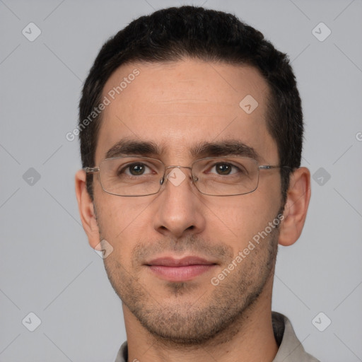 Joyful white adult male with short  brown hair and brown eyes