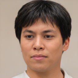 Neutral asian young-adult male with short  brown hair and brown eyes