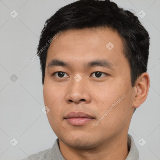 Neutral asian young-adult male with short  black hair and brown eyes