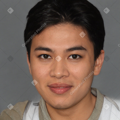 Joyful asian young-adult male with short  brown hair and brown eyes