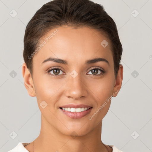 Joyful white young-adult female with short  brown hair and brown eyes