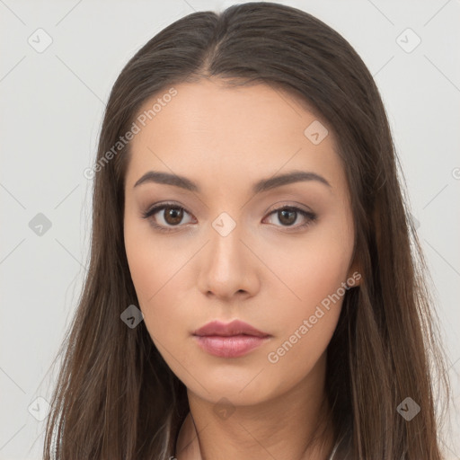 Neutral white young-adult female with long  brown hair and brown eyes