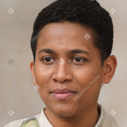 Joyful black young-adult male with short  brown hair and brown eyes